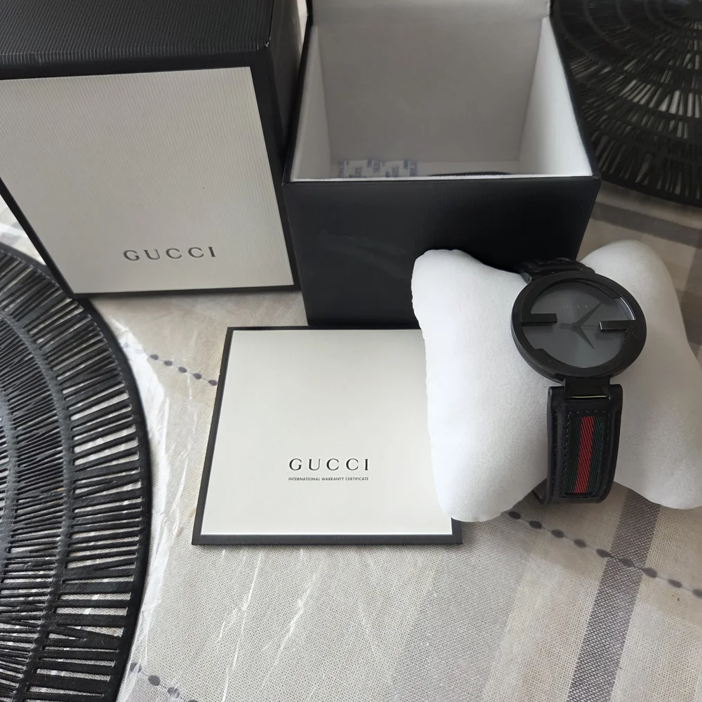 Gucci Men’s Black Watch with Signature Green-Red Stripe